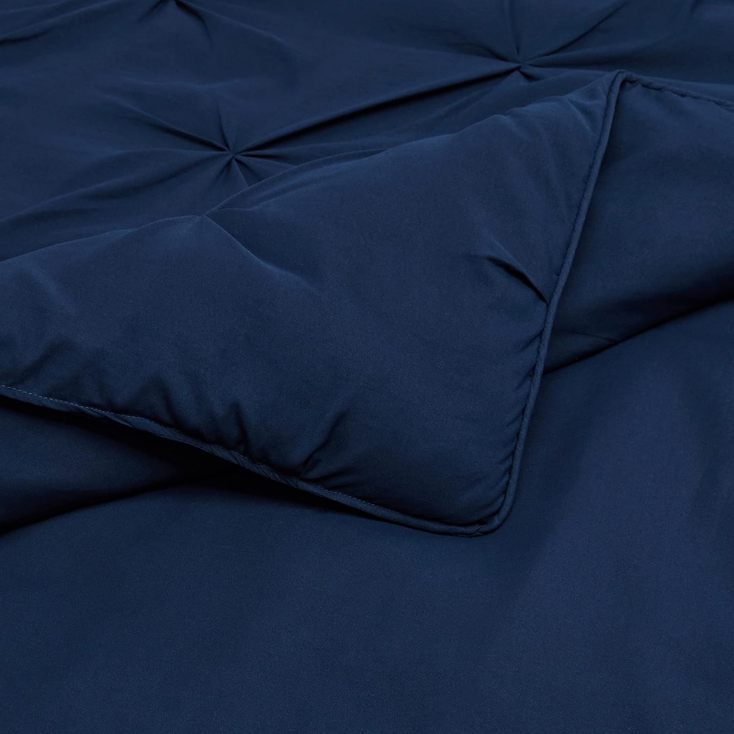 Amazon Basics Soft, Warm Down Alternative Queen Size Comforter Set, All-Season 3-Piece Bedding with Breathable Microfiber, Pinch Pleat Design, Full/Queen, Navy Blue - Image 4